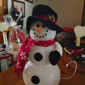 Charming Snowman with Red Scarf and Black Hat